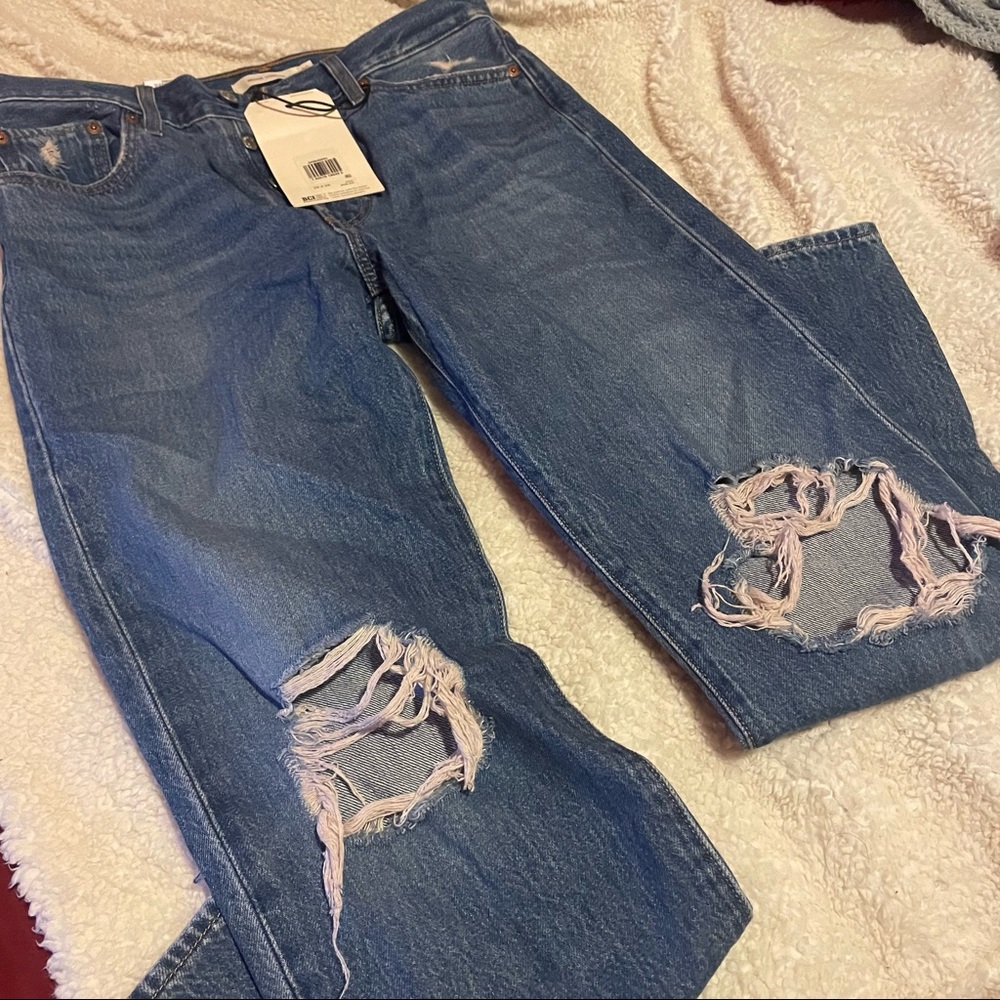 Levi’s ripped straight leg jeans
